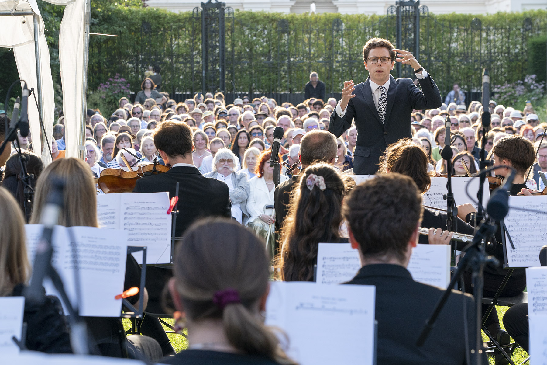 Orchestra of the Earth” with conductor John Warner